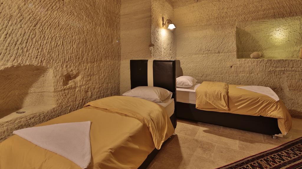 Garden Cave Hotel Гореме Номер фото