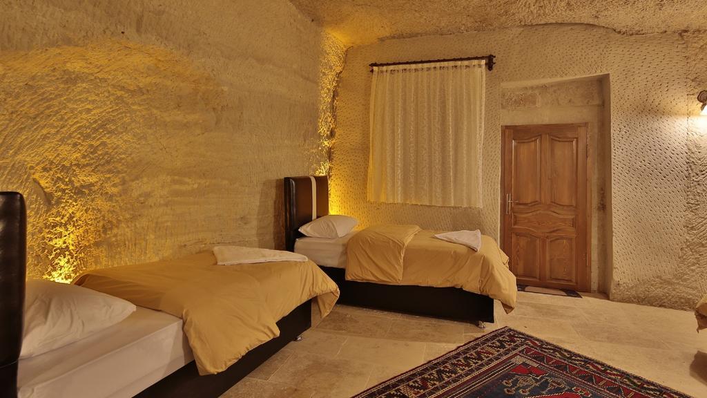 Garden Cave Hotel Гореме Номер фото