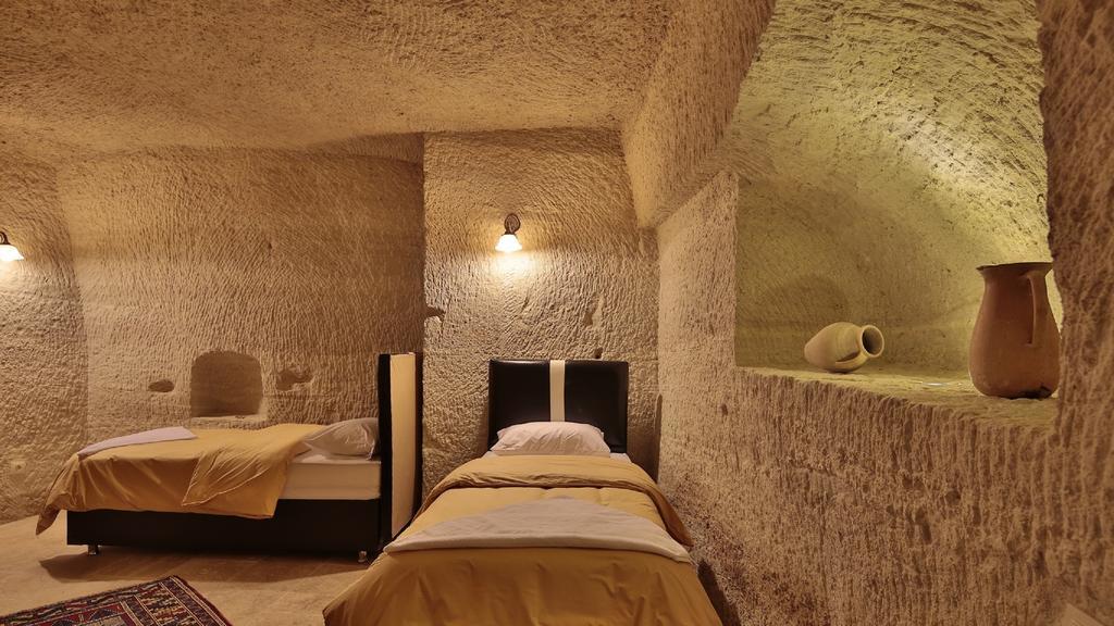 Garden Cave Hotel Гореме Номер фото