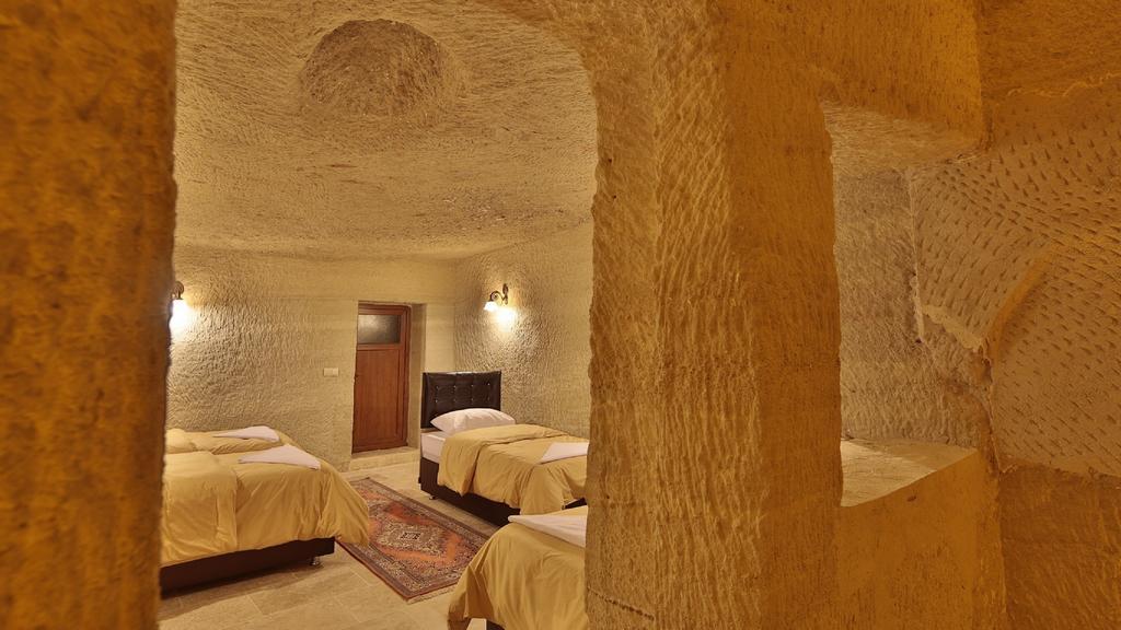 Garden Cave Hotel Гореме Номер фото