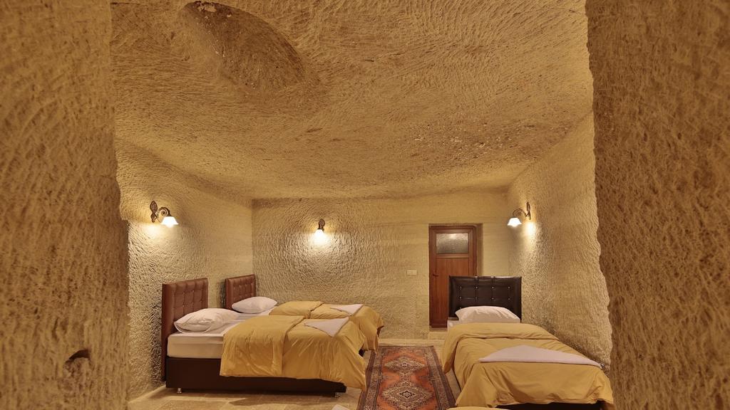 Garden Cave Hotel Гореме Номер фото