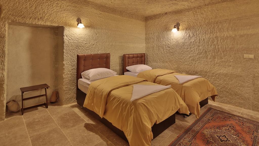 Garden Cave Hotel Гореме Номер фото