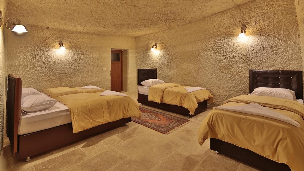 Garden Cave Hotel Гореме Номер фото