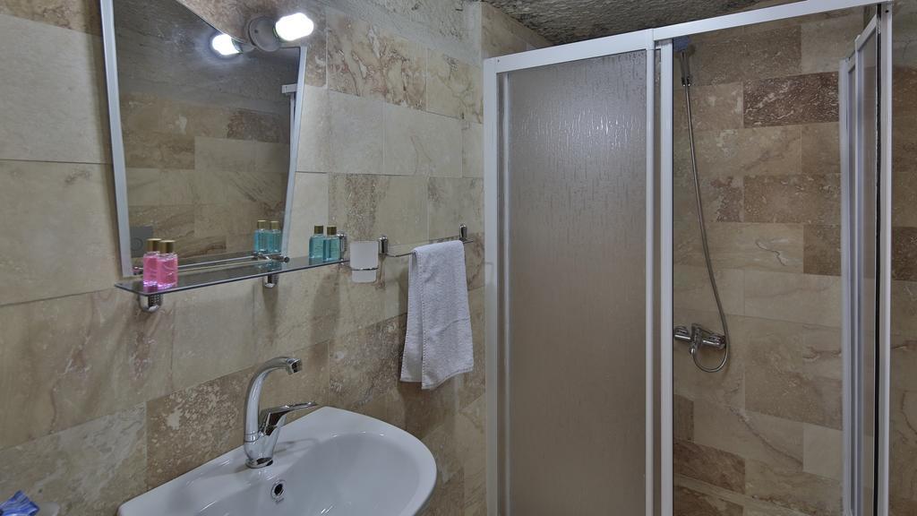 Garden Cave Hotel Гореме Номер фото