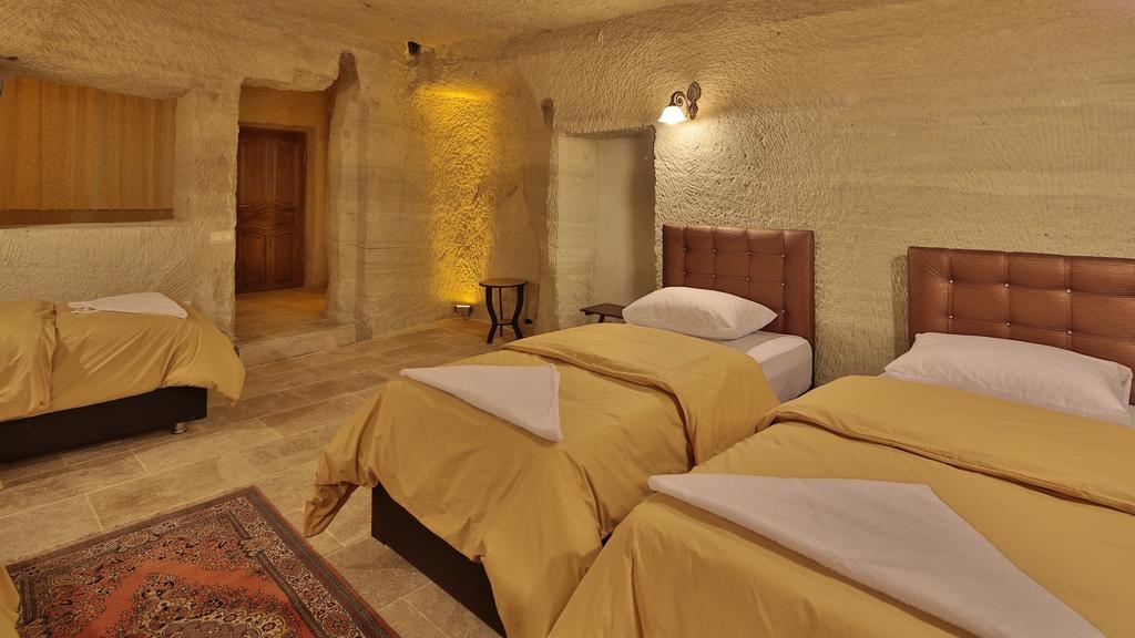 Garden Cave Hotel Гореме Номер фото